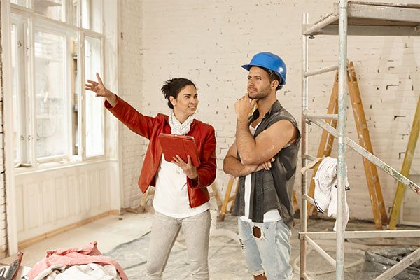 Homeowner asking her contractor a question